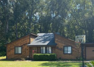 Roof replacement on a residential home in Monticello, FL, showcasing new roofing installation.