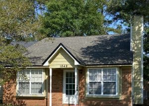 Roof replacement project by Roofs by PRO in Tallahassee, FL. Expert roofing crew installing new shin.