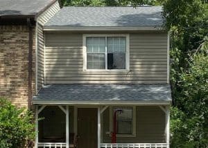 Roof replacement project showing new roofing installation on a residential home.