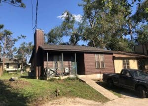 Residential roof replacement with new shingles and improved durability.