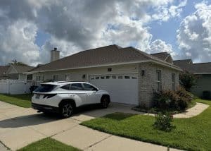 Modern residential roof with new shingles and clean appearance.