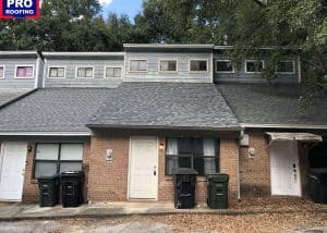 Residential roof replacement with new asphalt shingles in Crawfordville, FL.