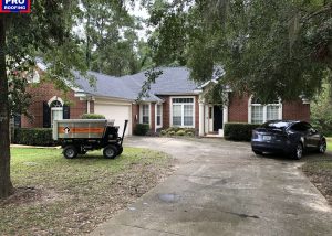 Storm damage repair and roof installation by Roofs by PRO. Expert roofing contractors working on res.