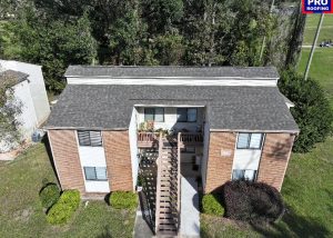 Aerial view of a residential roof replacement project in Crawfordville, Florida.