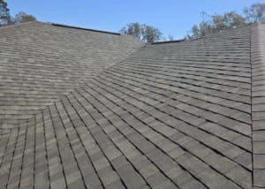 High-quality asphalt shingles installed on a residential roof for durability and weather resistance.