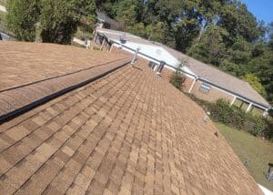 Roofing installation on a residential house in Tallahassee, Florida.